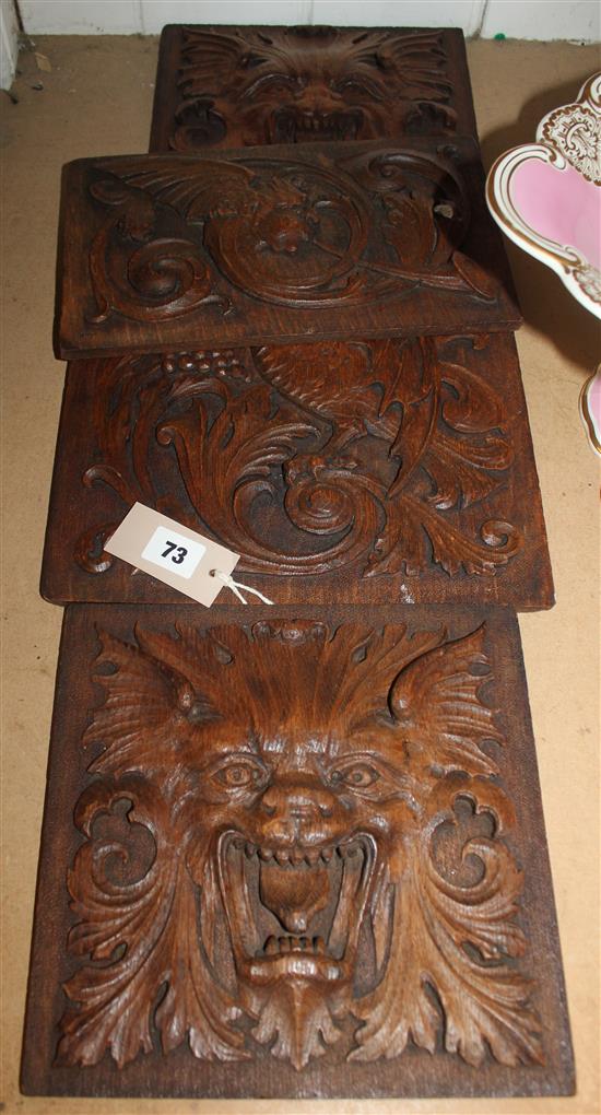 Pair of carved oak lion mask wall panels, a similar panel with griffin & vine carving & another with motif of Mercury